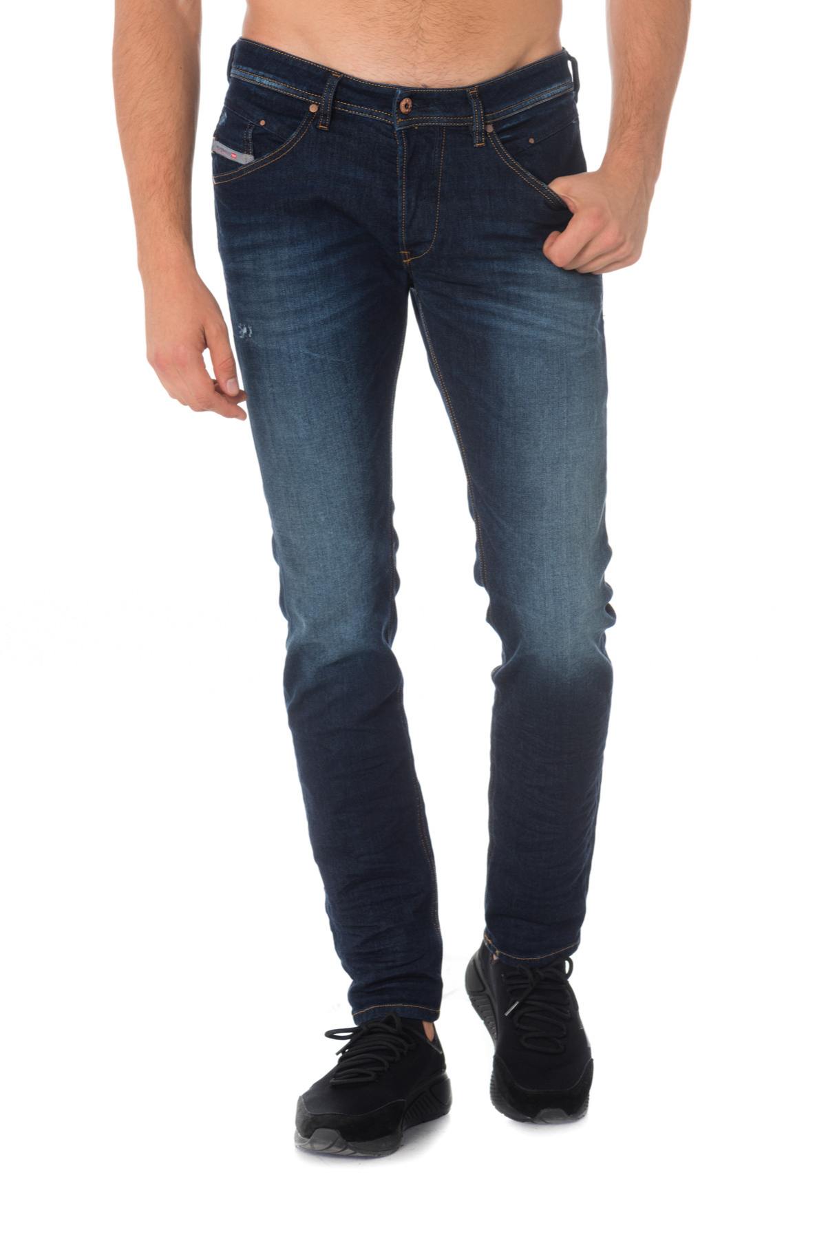 Diesel men's jeans in faded blue and aged effect - Image n°1