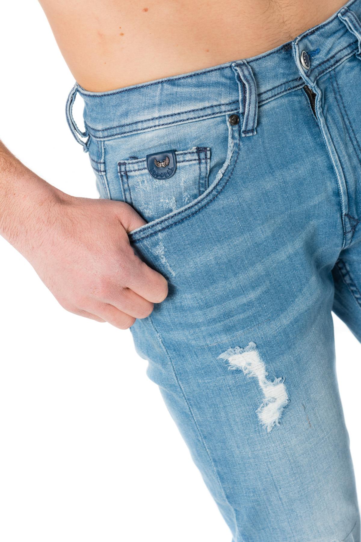 Men's light blue jeans with worn and torn effect - Image n°6