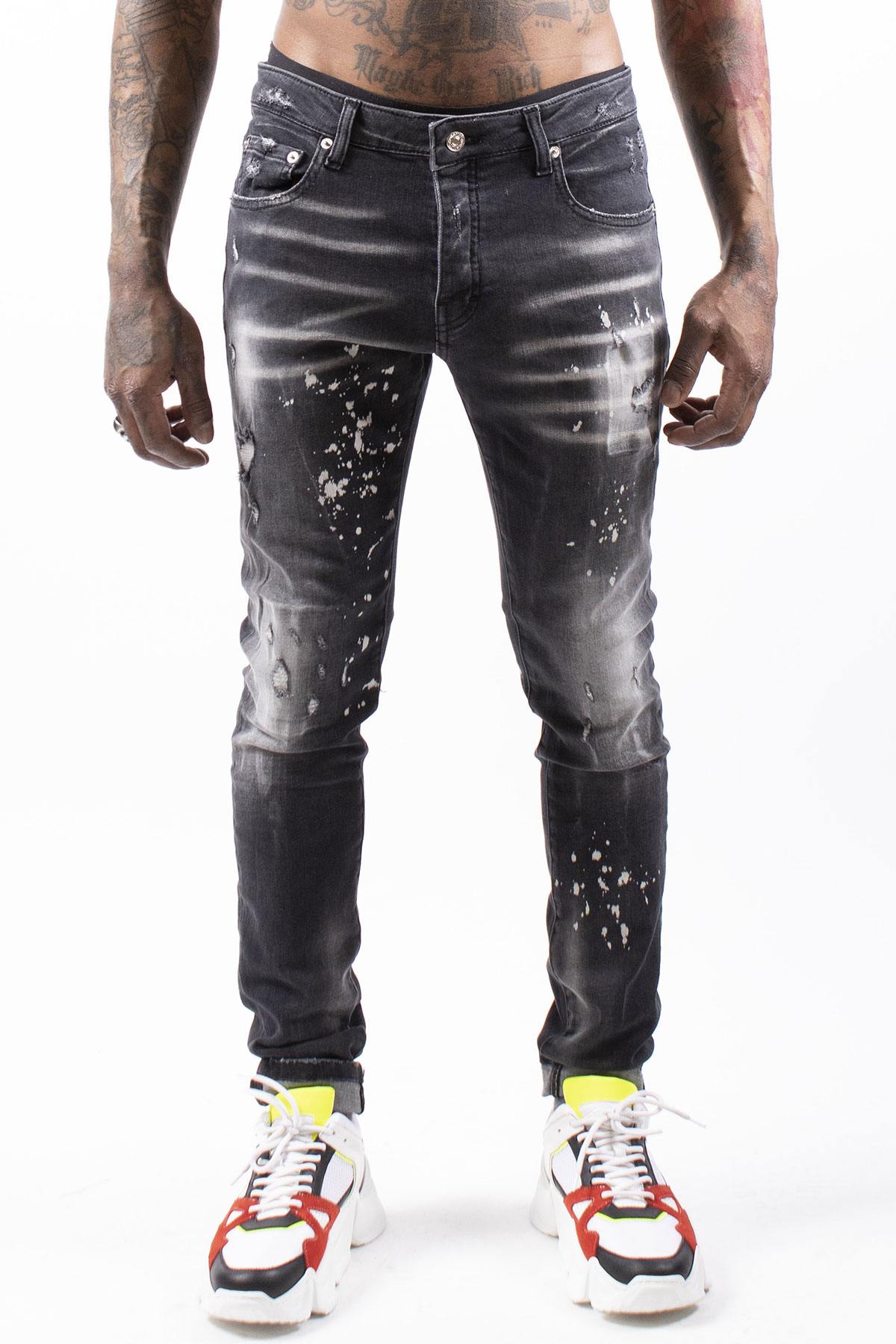 Black faded and spotted jeans - Image n°1