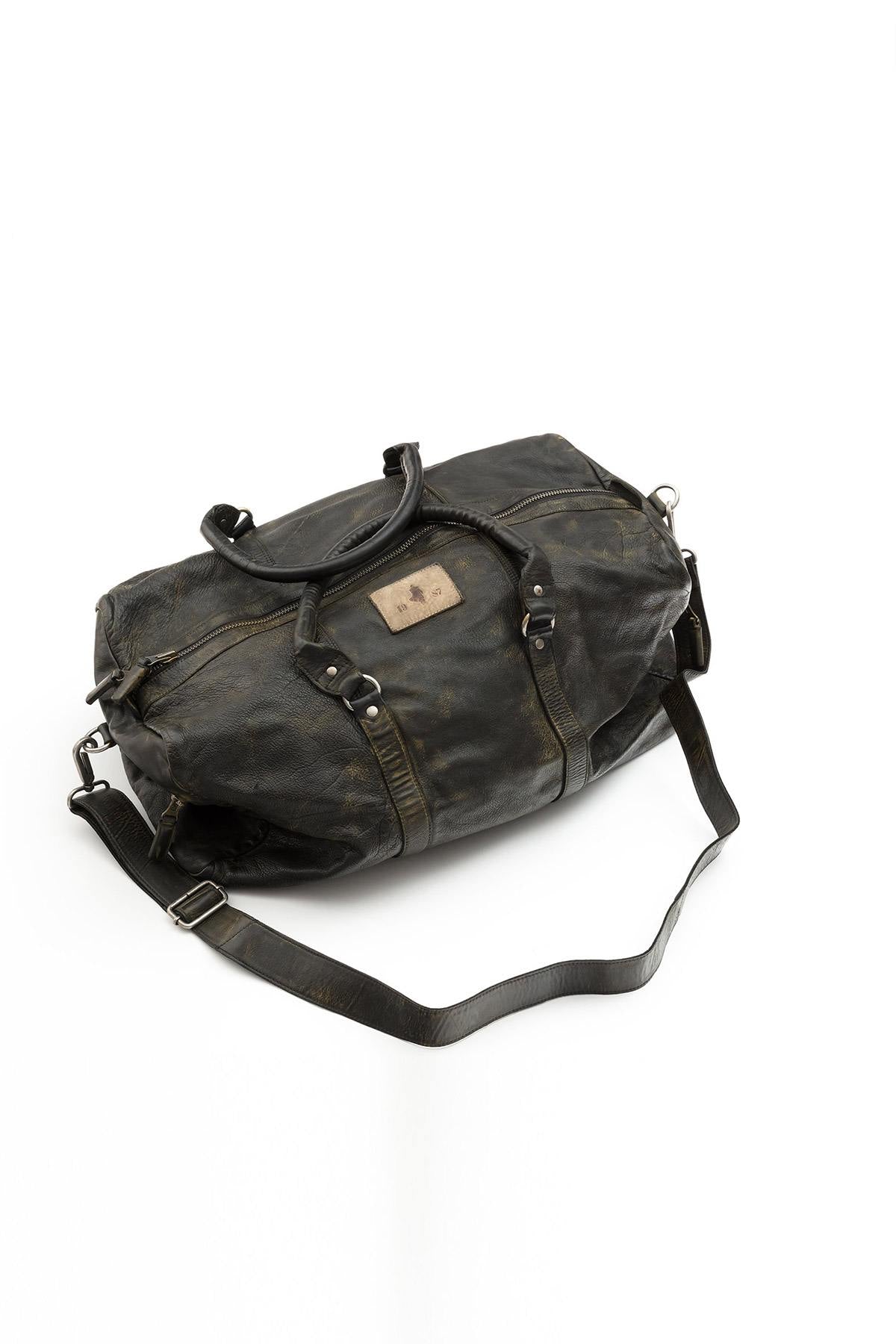 Vintage leather travel bag - Image n°1