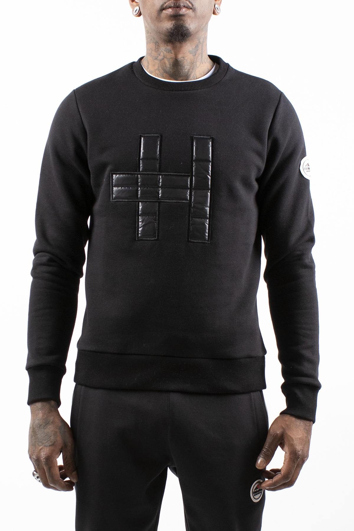 Black round neck sweater with embossed H logo - Image n°1