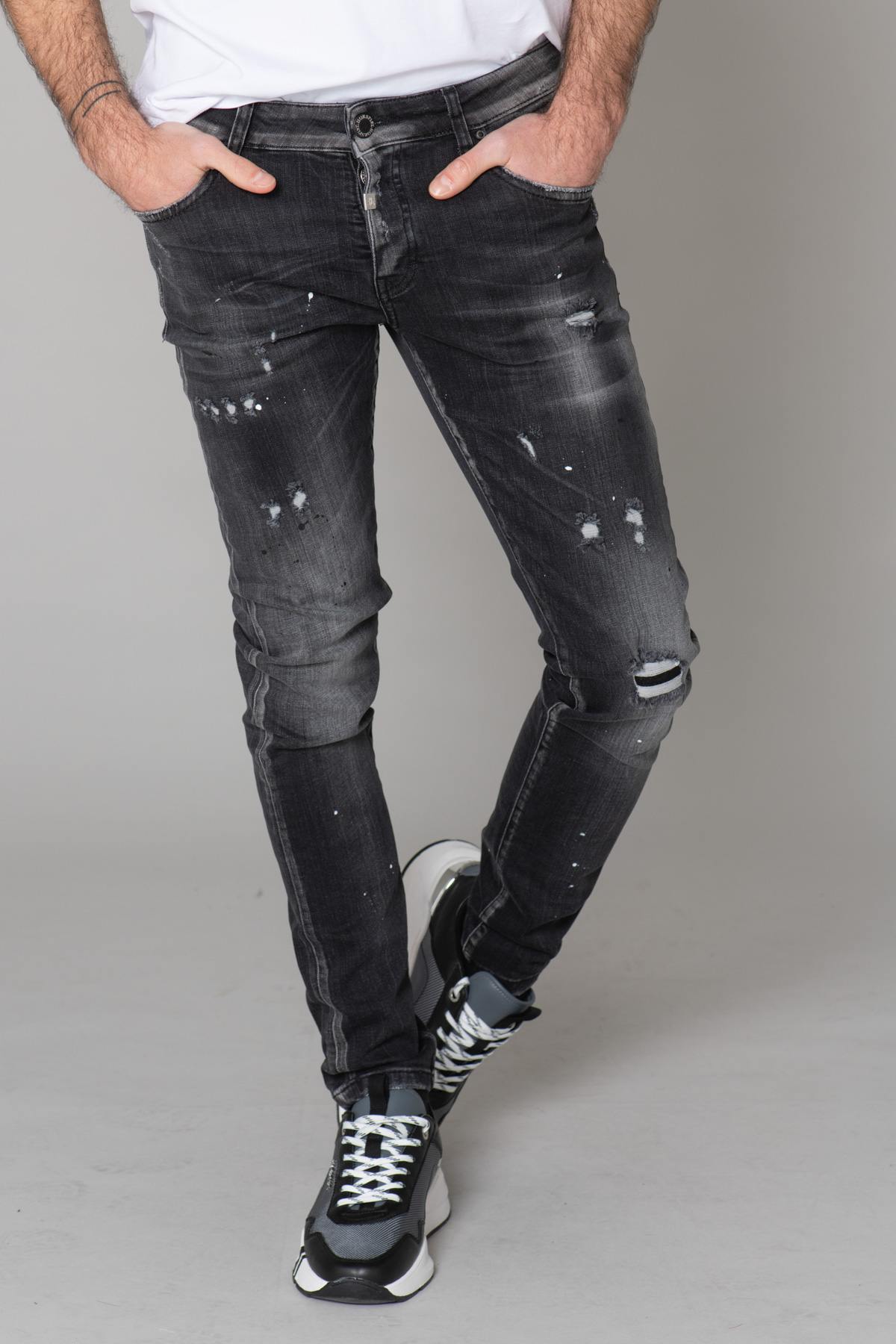 Washed black jeans with destroyed finish - Image n°13