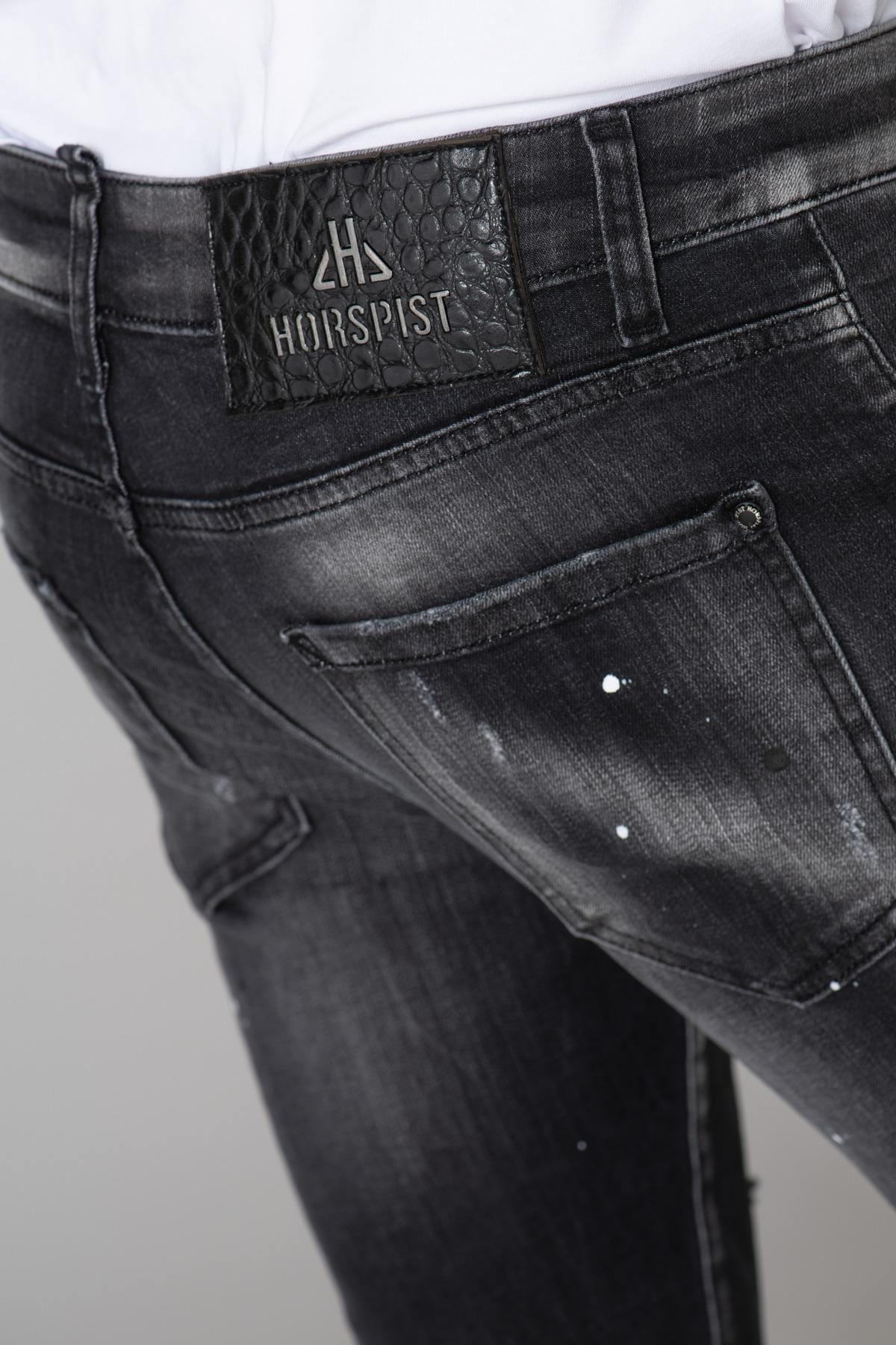 Washed black jeans with destroyed finish - Image n°16