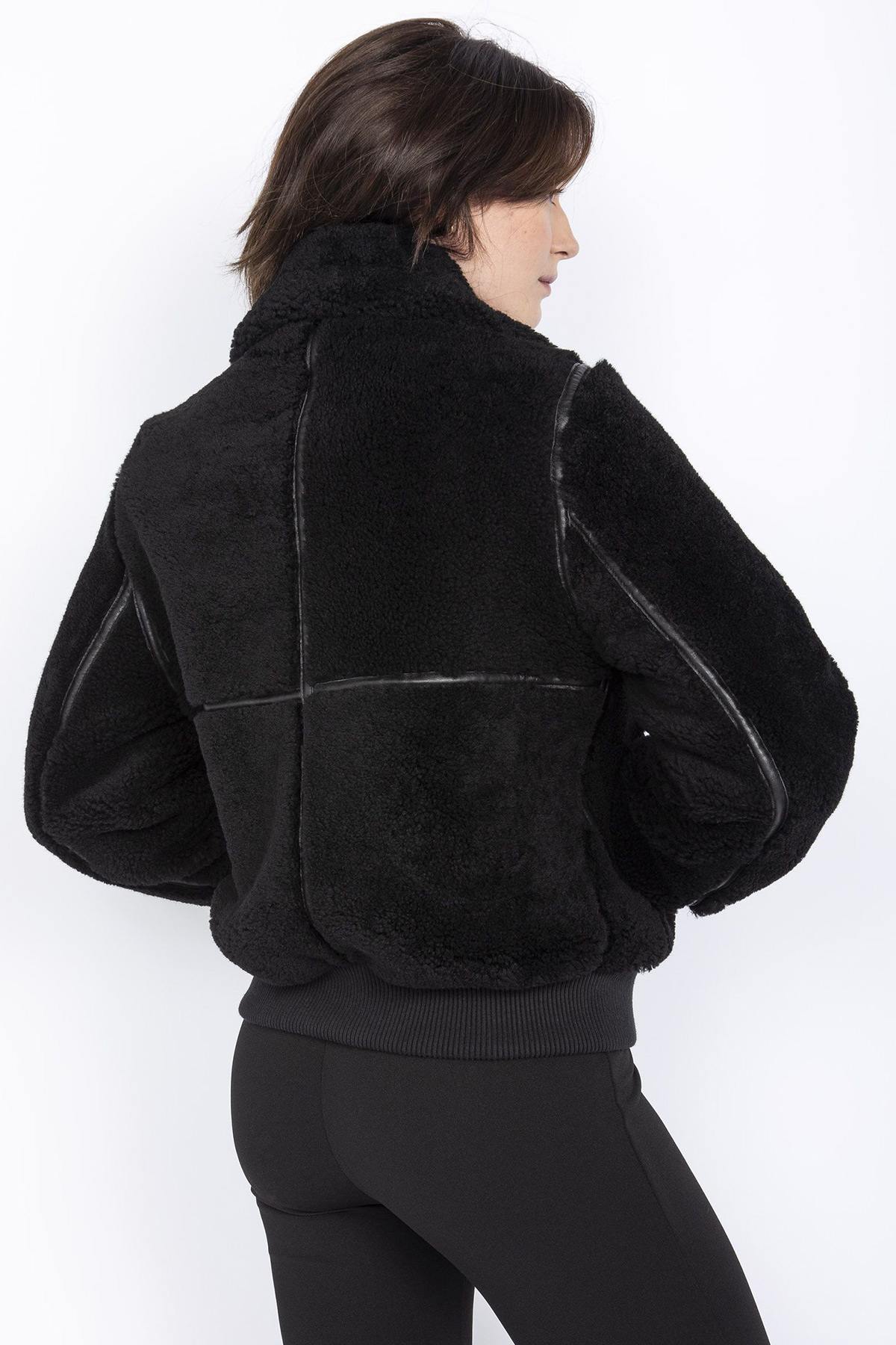 Women's black bomber jacket in shearling and leather details - Image n°3